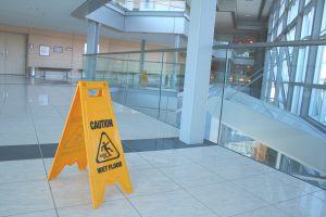 Caution wet floor sign in a new corporate building.